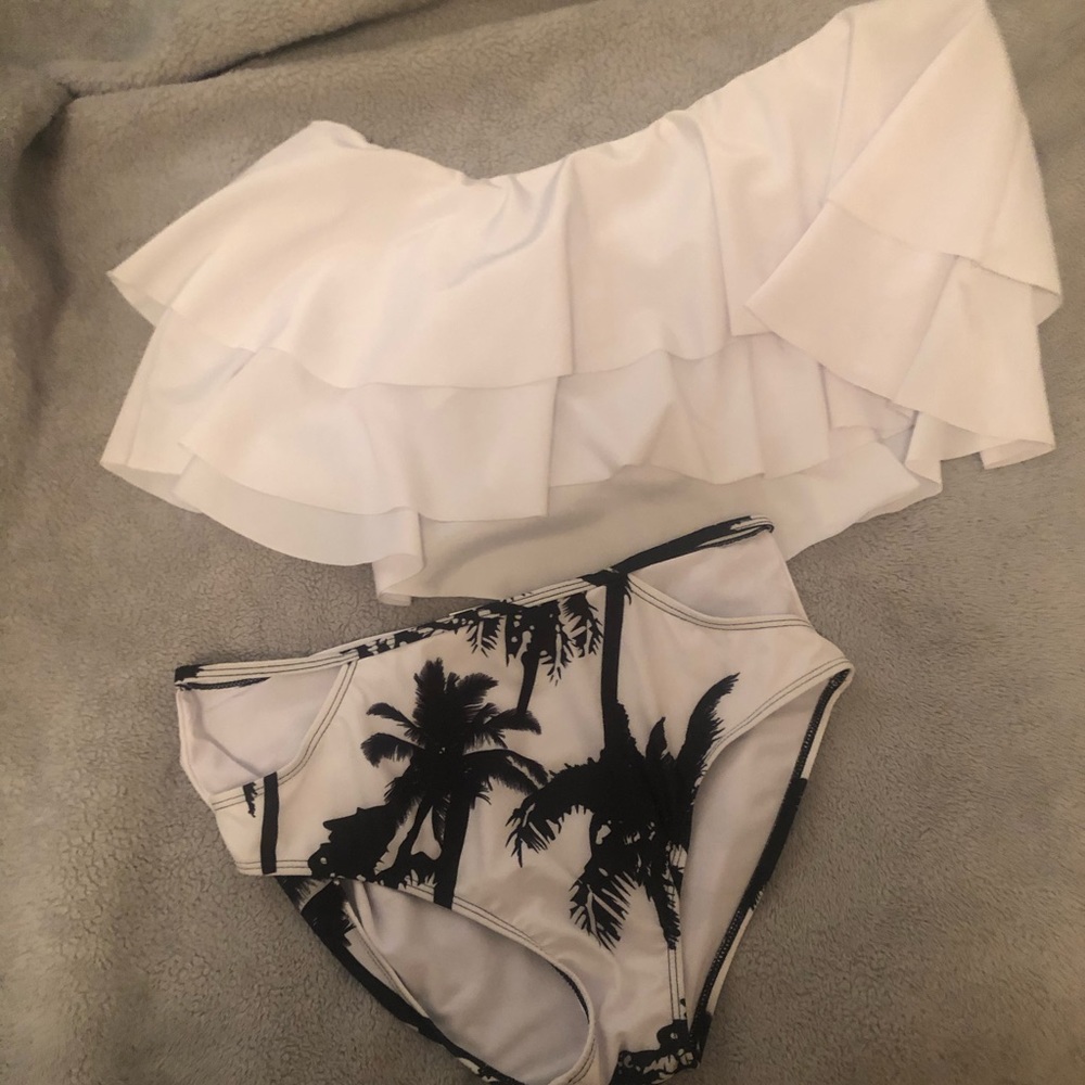 Never Worn two piece swim suit!